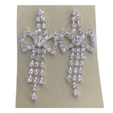 diamond-cz-bow-bling-drop-dangle-silver-earrings-front-of-earrings-on-earring-card