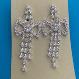 diamond-cz-bow-bling-drop-dangle-silver-earrings-1-earrings-on-a card-2