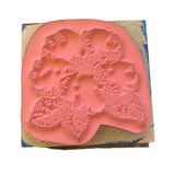 Bottom of floral stamp