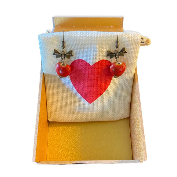 red-heart-and-bow-drop-earrings-front