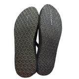 Bottom of black Teva flip flops