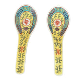 yellow chinese longevity soup spoons from back of spoon